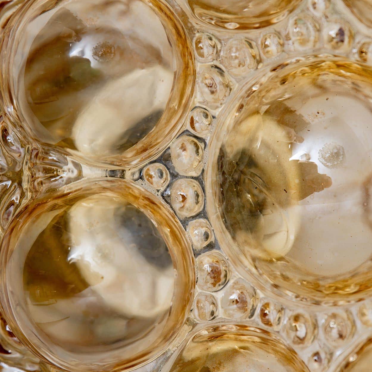 1 of the 2 Amber Bubble Glass Pendant Light Fixtures by Helena Tynell, 1960