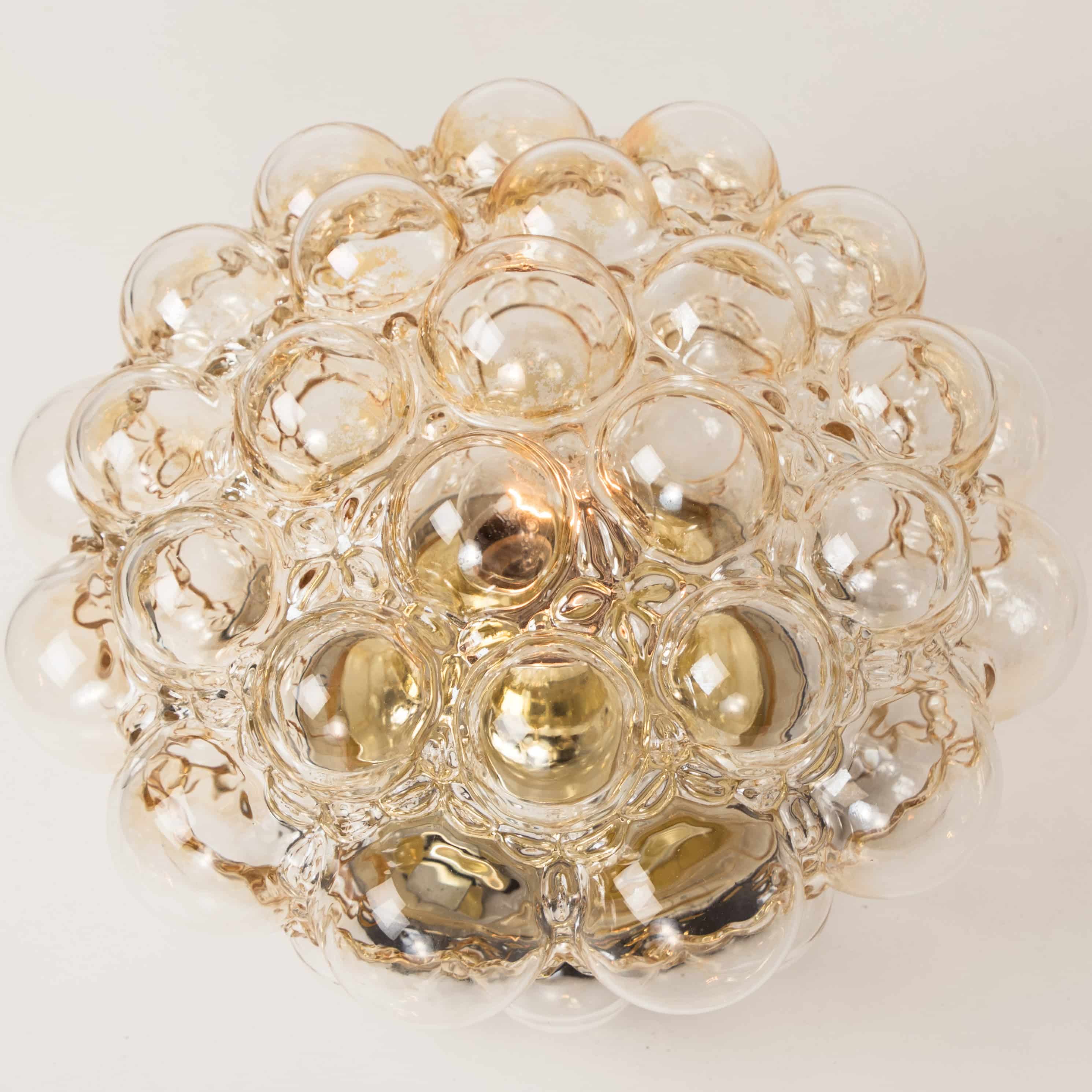1 of the 2 Amber Bubble Glass Pendant Light Fixtures by Helena Tynell, 1960