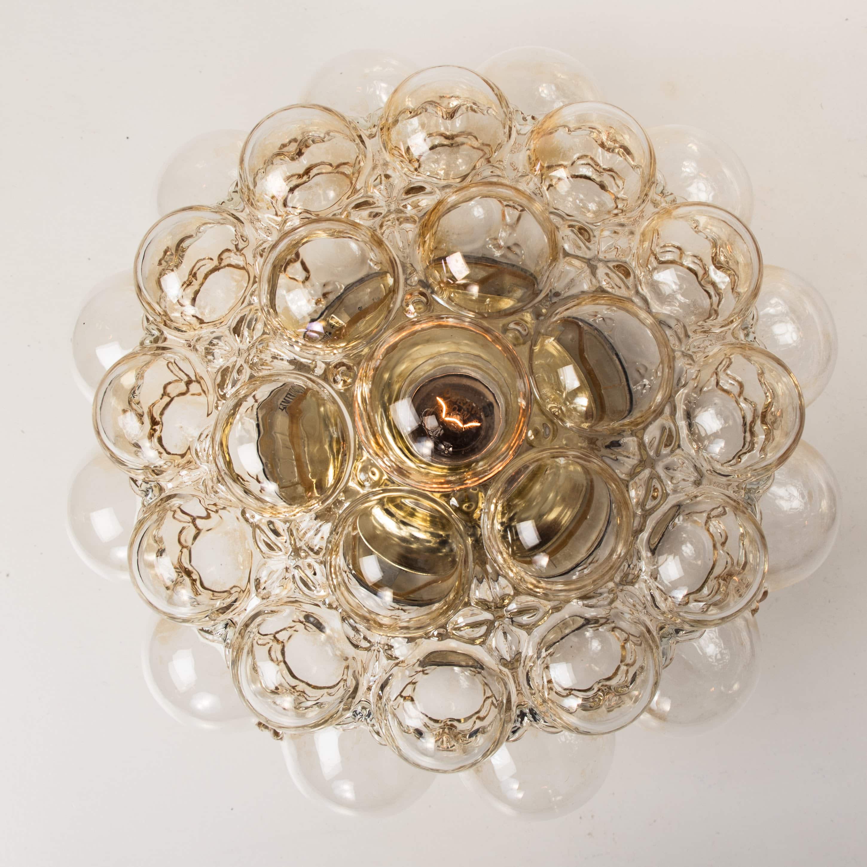 1 of the 2 Amber Bubble Glass Pendant Light Fixtures by Helena Tynell, 1960