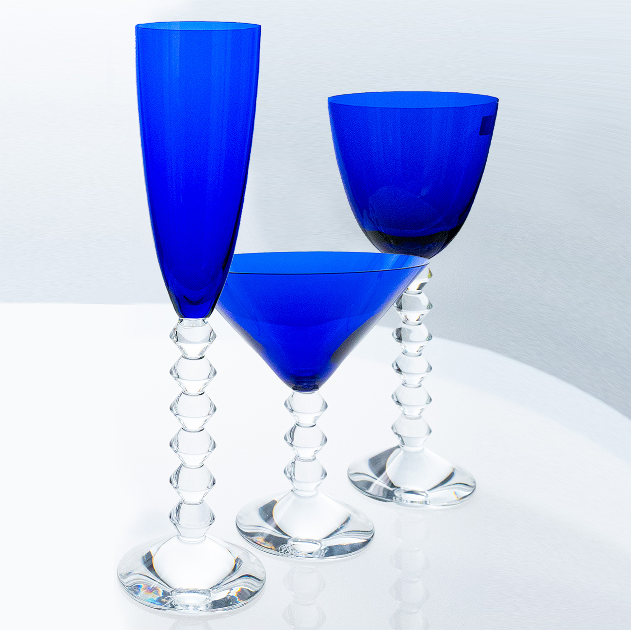 Set of 18 Exquise Deep Blue Baccarat Crystal glasses, France