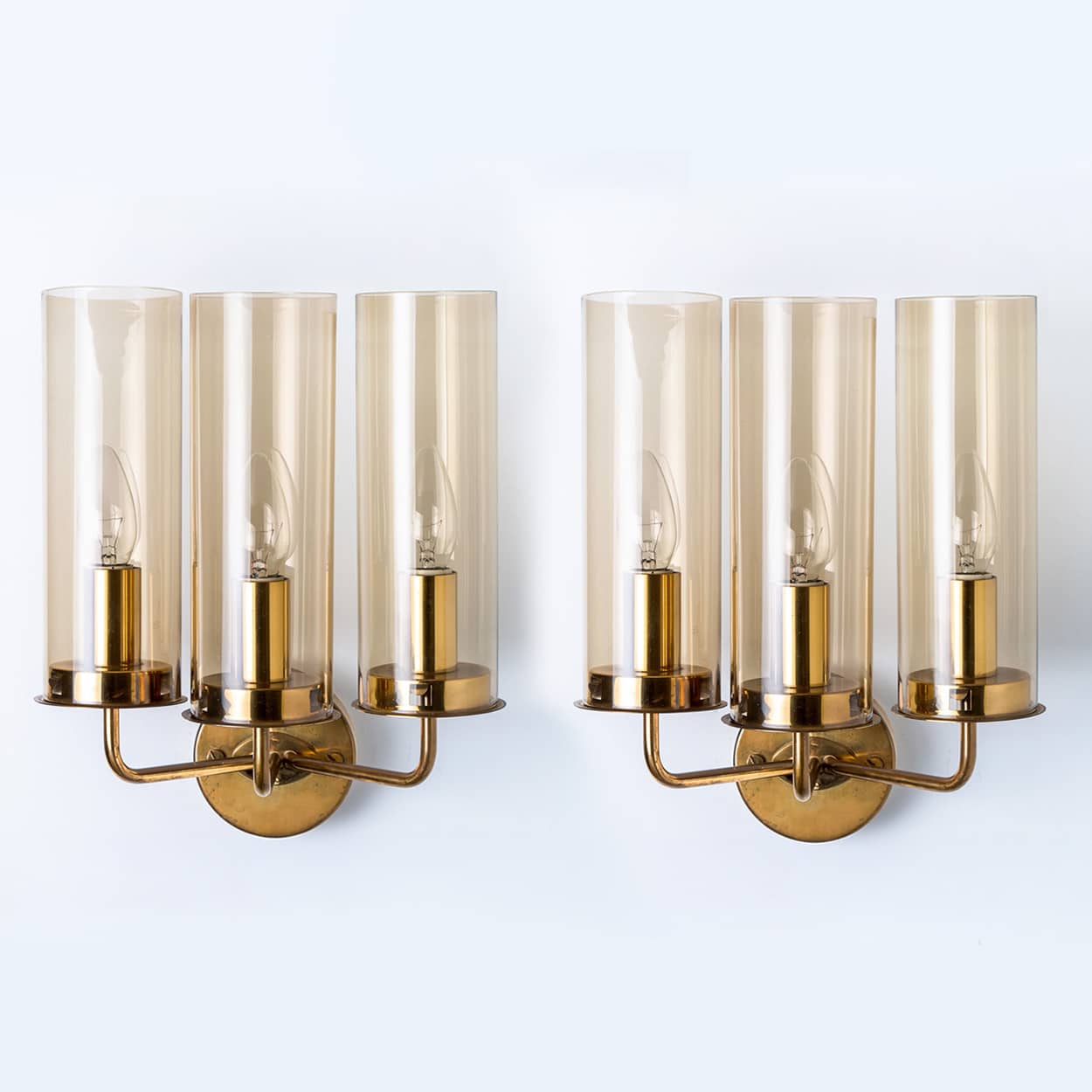 Pair of Brass and Amber Glass Wall Lights by Jakobsson, 1960