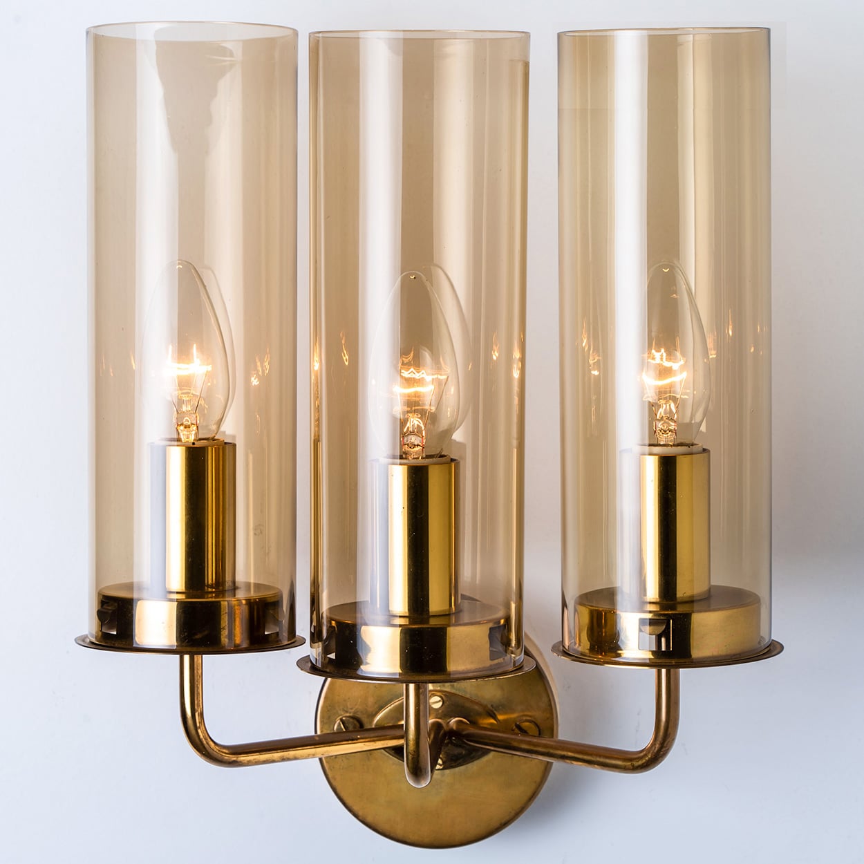 Pair of Brass and Amber Glass Wall Lights by Jakobsson, 1960