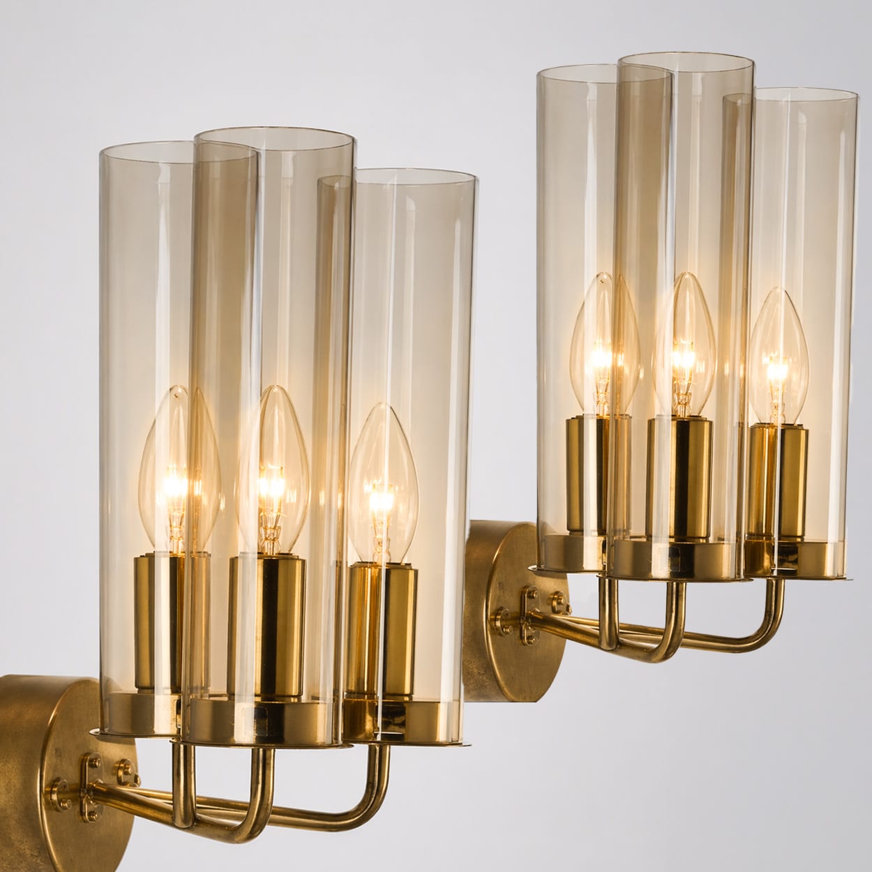 Pair of Brass and Amber Glass Wall Lights by Jakobsson, 1960