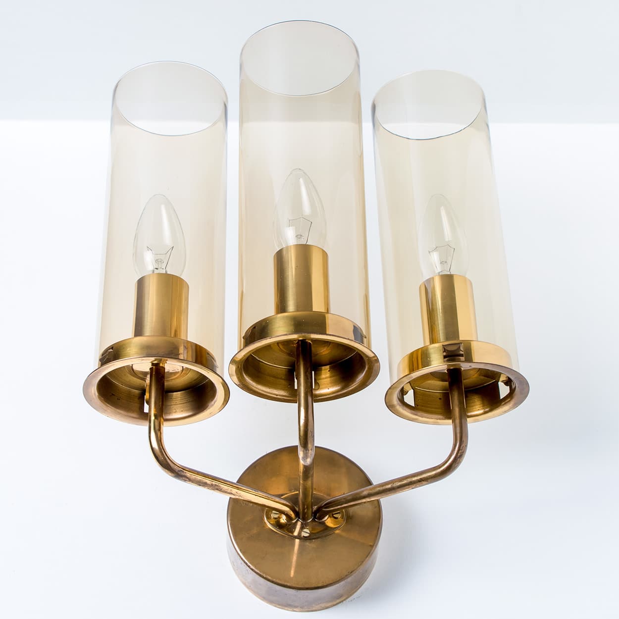 Pair of Brass and Amber Glass Wall Lights by Jakobsson, 1960