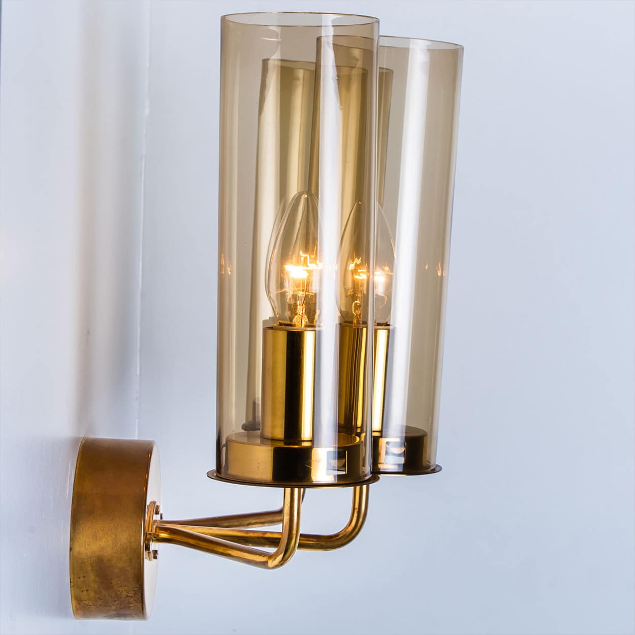 Pair of Brass and Amber Glass Wall Lights by Jakobsson, 1960