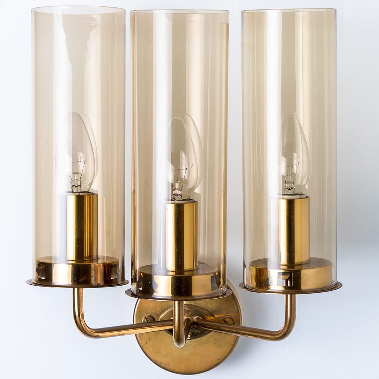 Pair of Brass and Amber Glass Wall Lights by Jakobsson, 1960
