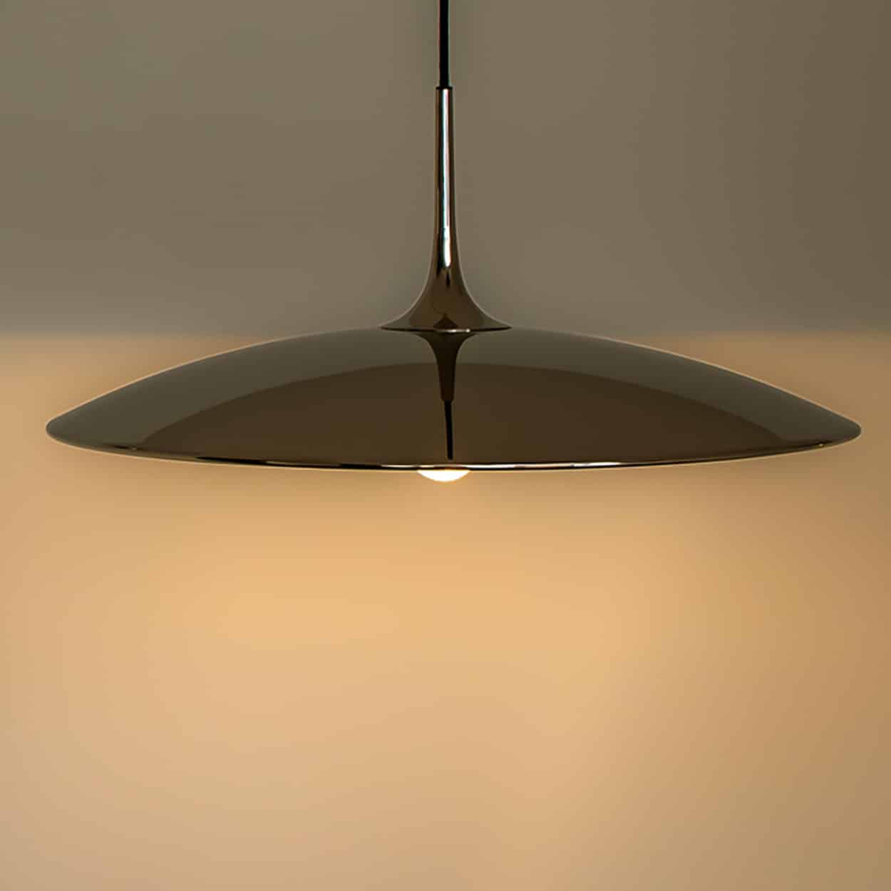 1 of the 3 Chrome Onos Fixtures by Florian Schulz with Black Cord