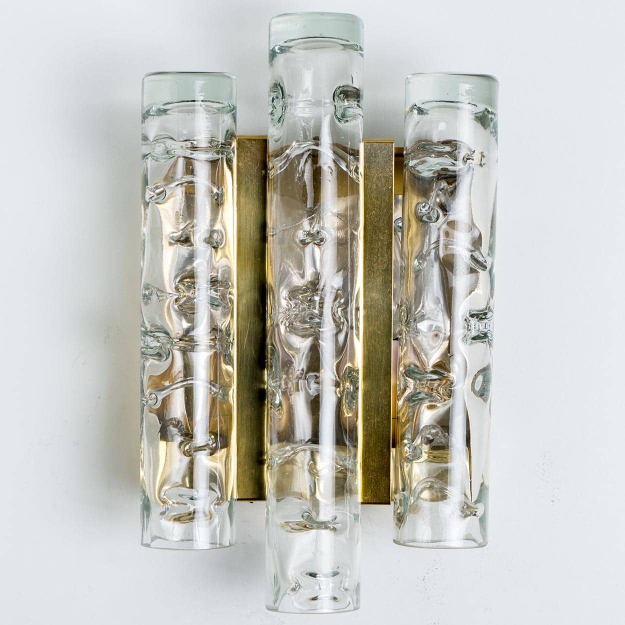 A pair of Textured Ice Glass Tubes and Brass Wall Sconce by Doria, 1970