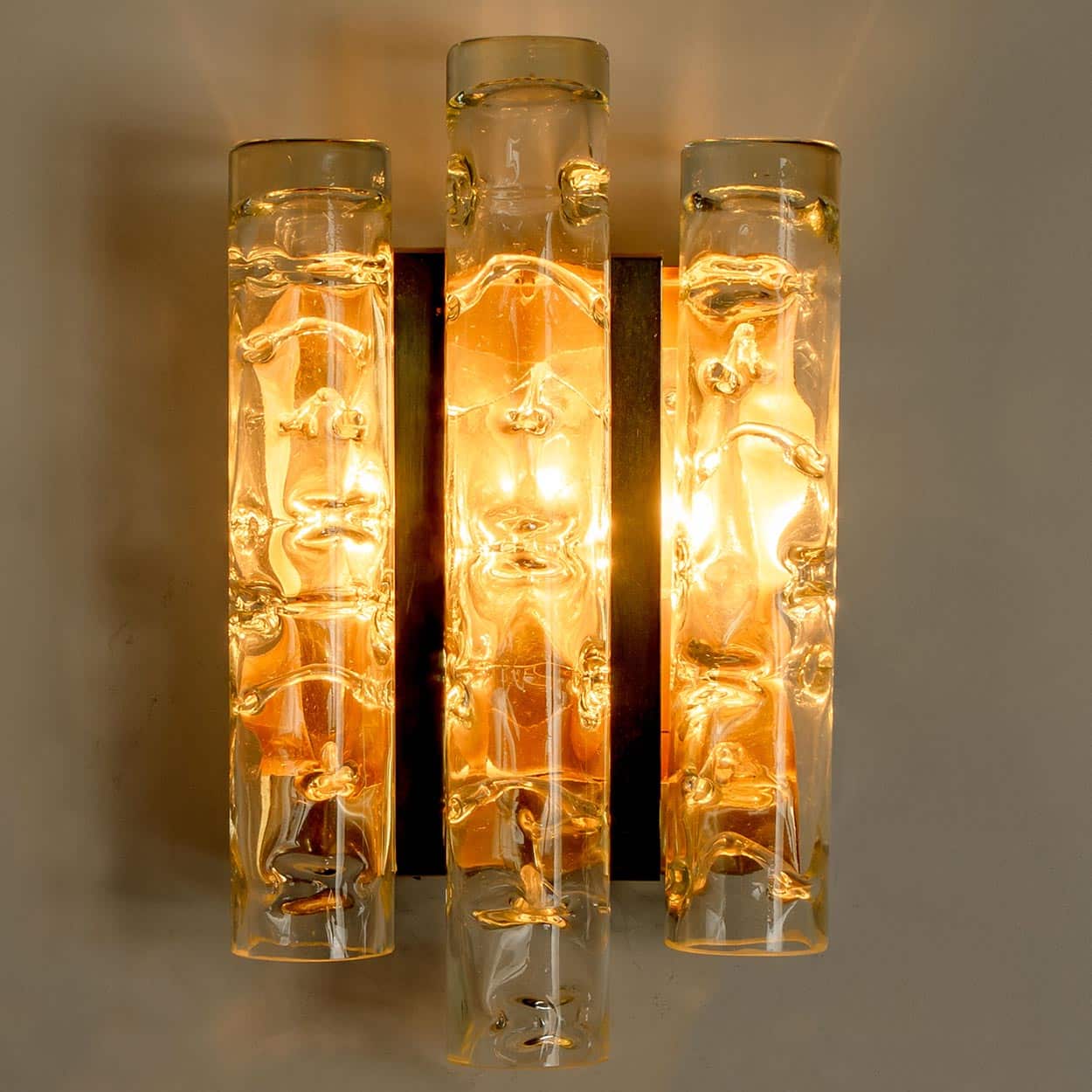 A pair of Textured Ice Glass Tubes and Brass Wall Sconce by Doria, 1970
