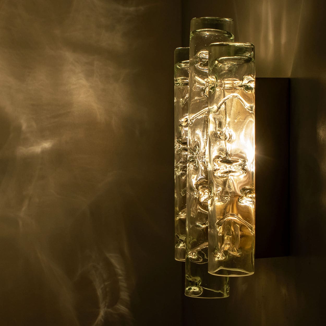 A pair of Textured Ice Glass Tubes and Brass Wall Sconce by Doria, 1970