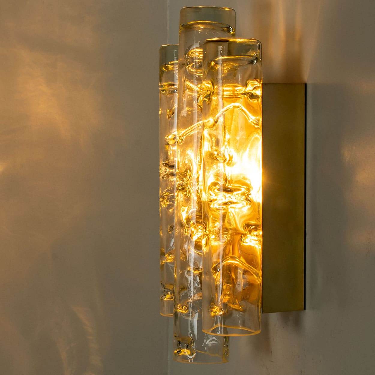 A pair of Textured Ice Glass Tubes and Brass Wall Sconce by Doria, 1970