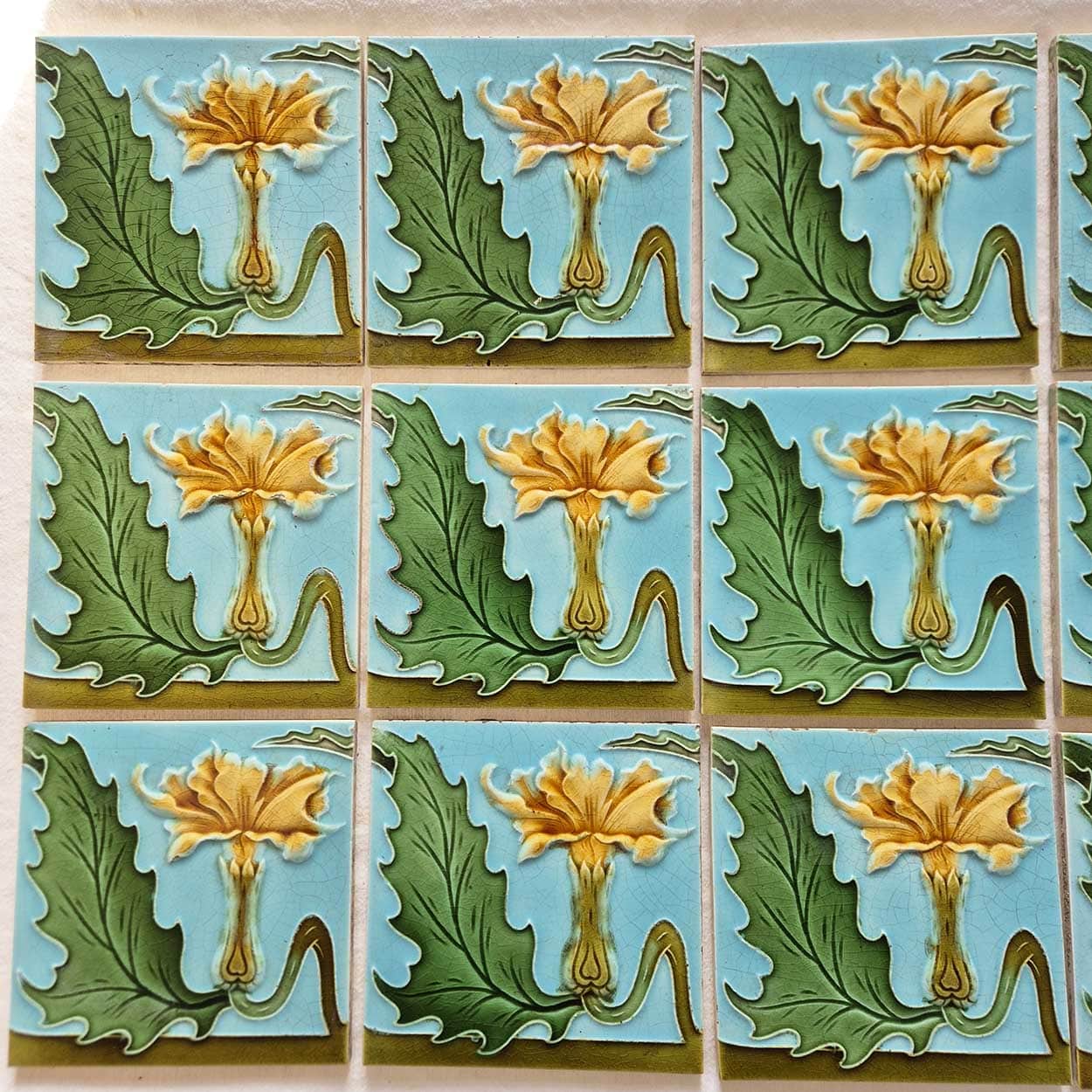 1 of the 18 Honey Yellow Flower Glazed Art Nouveau Relief Tiles, Maison Helman
