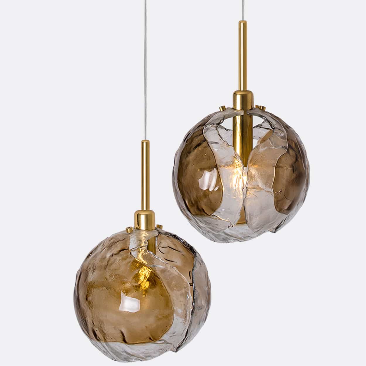 1 of the 2 Kalmar Chandelier Pendants Steel Cord, Gold Brass Smoked Glass, 1970s