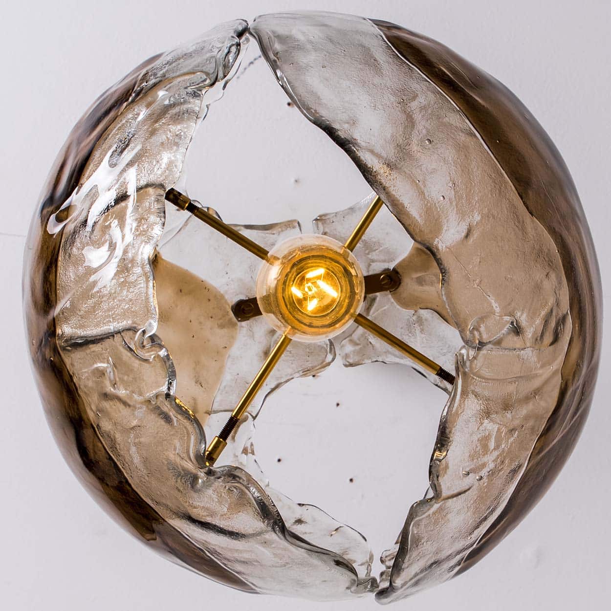 1 of the 2 Kalmar Chandelier Pendants Steel Cord, Gold Brass Smoked Glass, 1970s