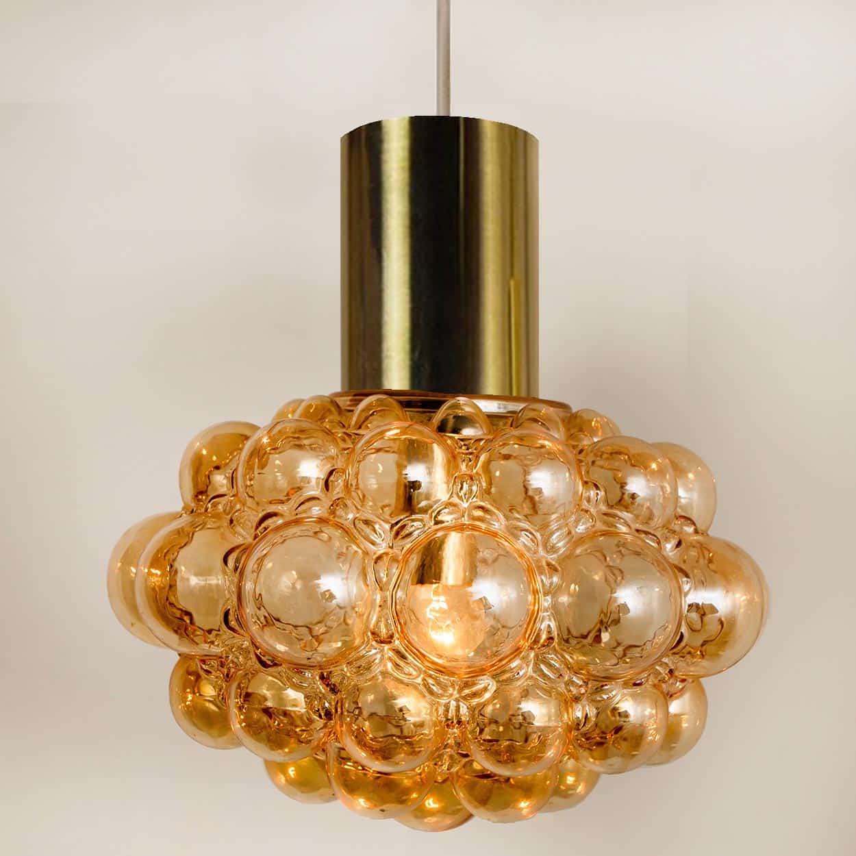 1 of the 2 Bubbled Glass and Brass Pendants by Helena Tynell, Germany 1970