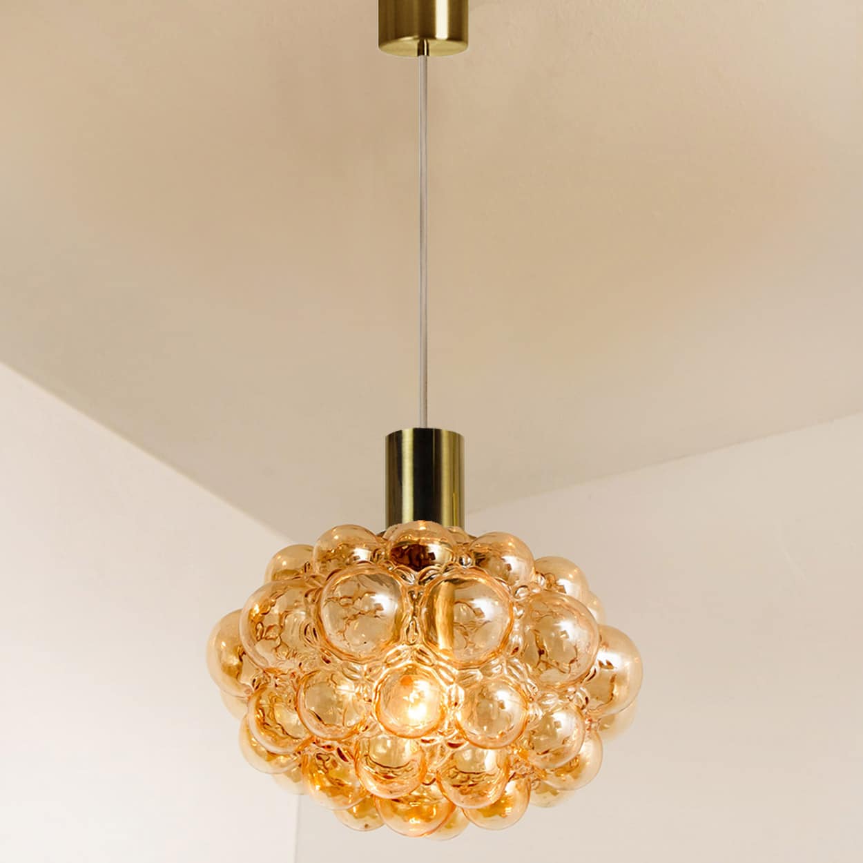 1 of the 2 Bubbled Glass and Brass Pendants by Helena Tynell, Germany 1970