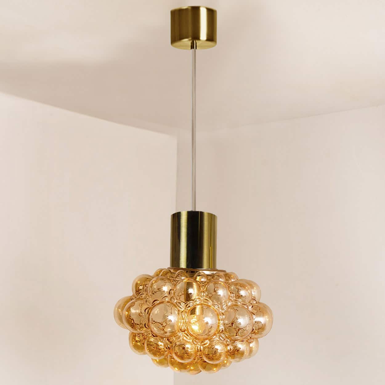 1 of the 2 Bubbled Glass and Brass Pendants by Helena Tynell, Germany 1970