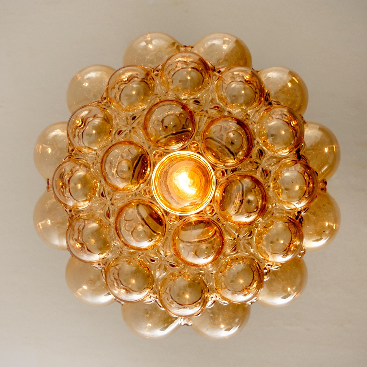 1 of the 2 Bubbled Glass and Brass Pendants by Helena Tynell, Germany 1970