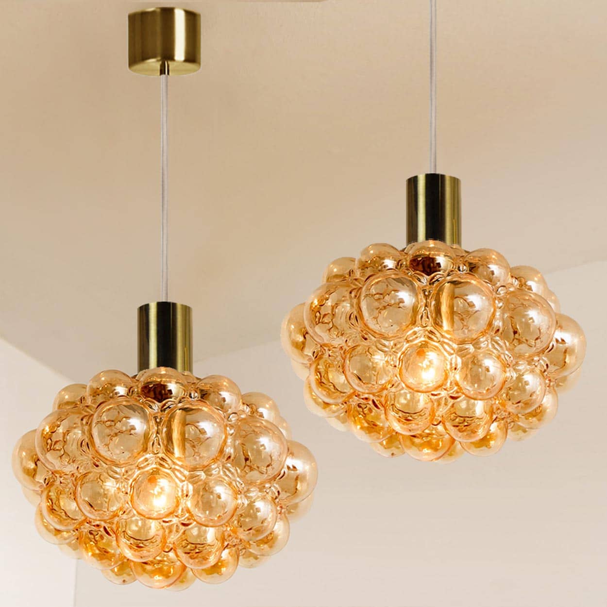 1 of the 2 Bubbled Glass and Brass Pendants by Helena Tynell, Germany 1970