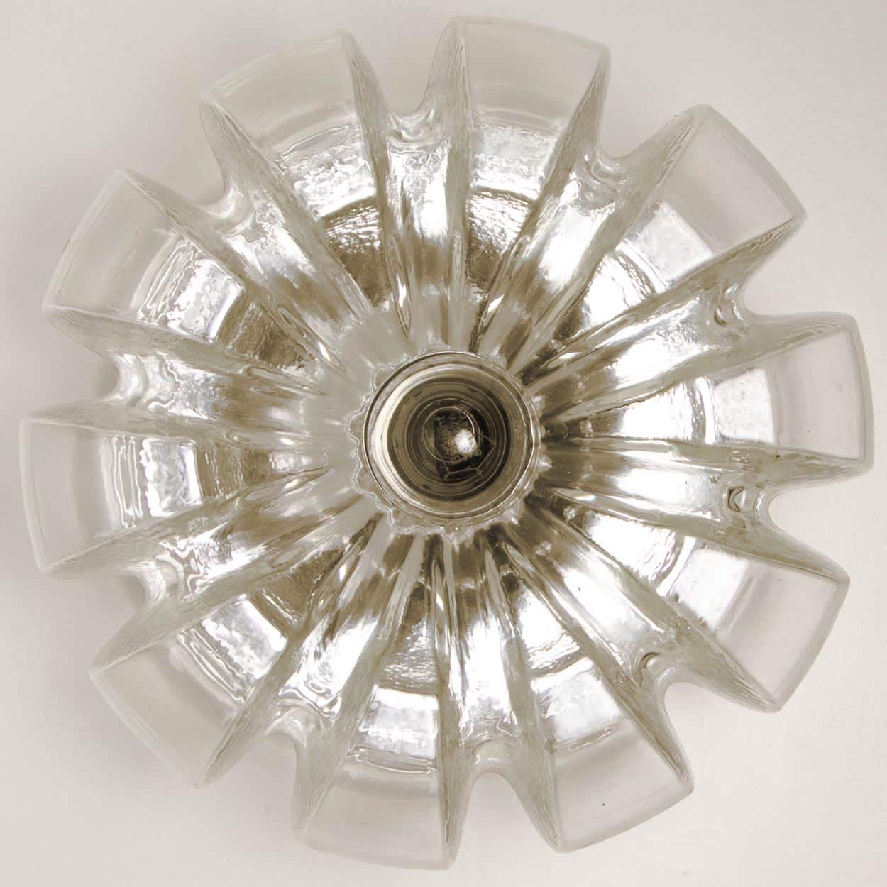 Several Peill Putzler Clear Glass Wall lights Flush Mounts, 1970