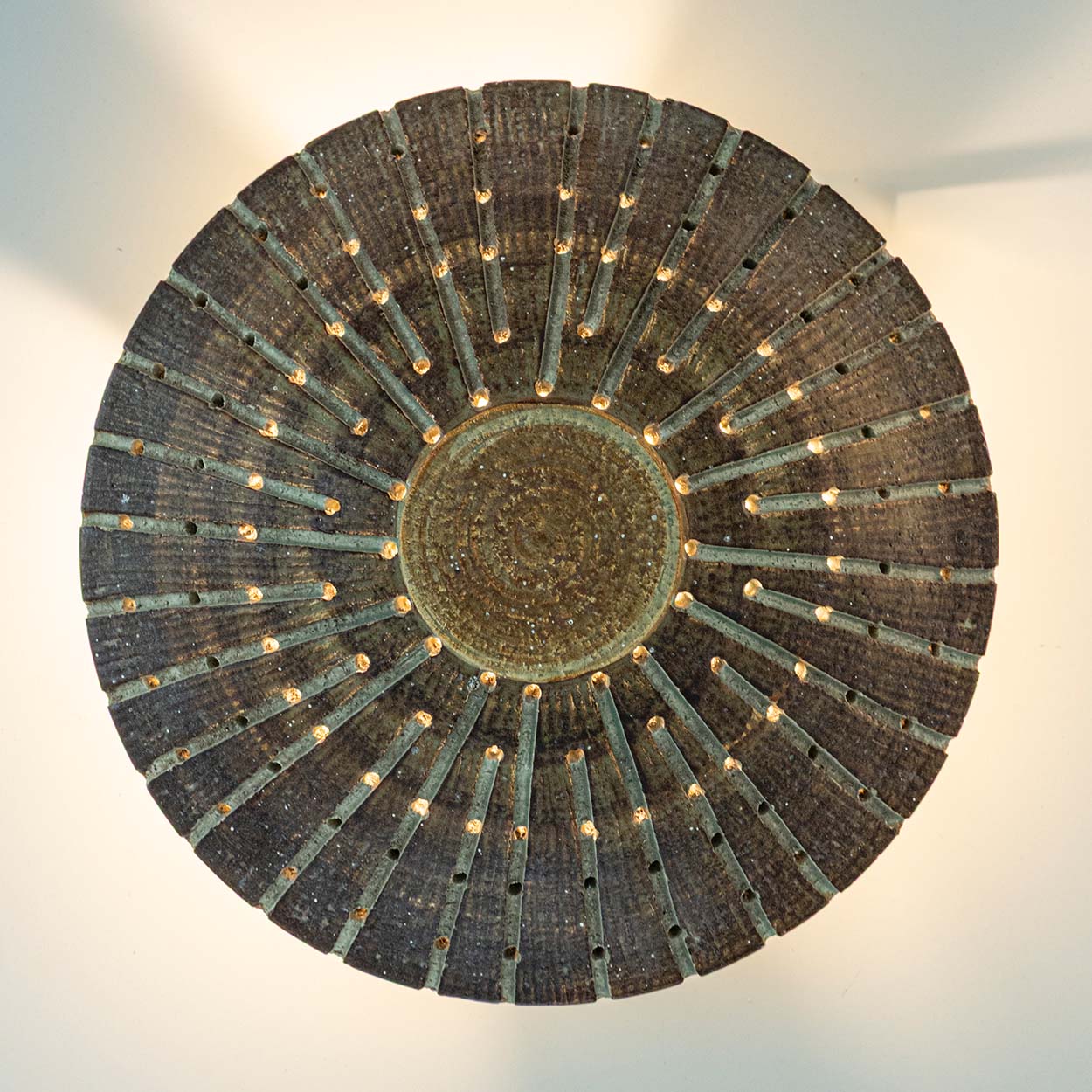 1 of the 2 Ceramic Round Wall Lights Holes in the style of Axella, Denmark 1970