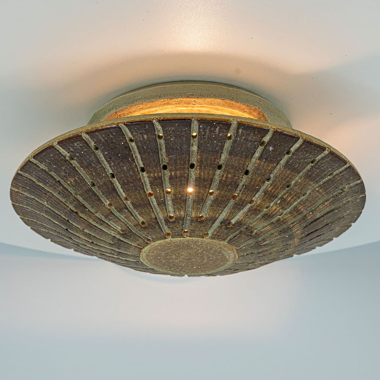1 of the 2 Ceramic Round Wall Lights Holes in the style of Axella, Denmark 1970