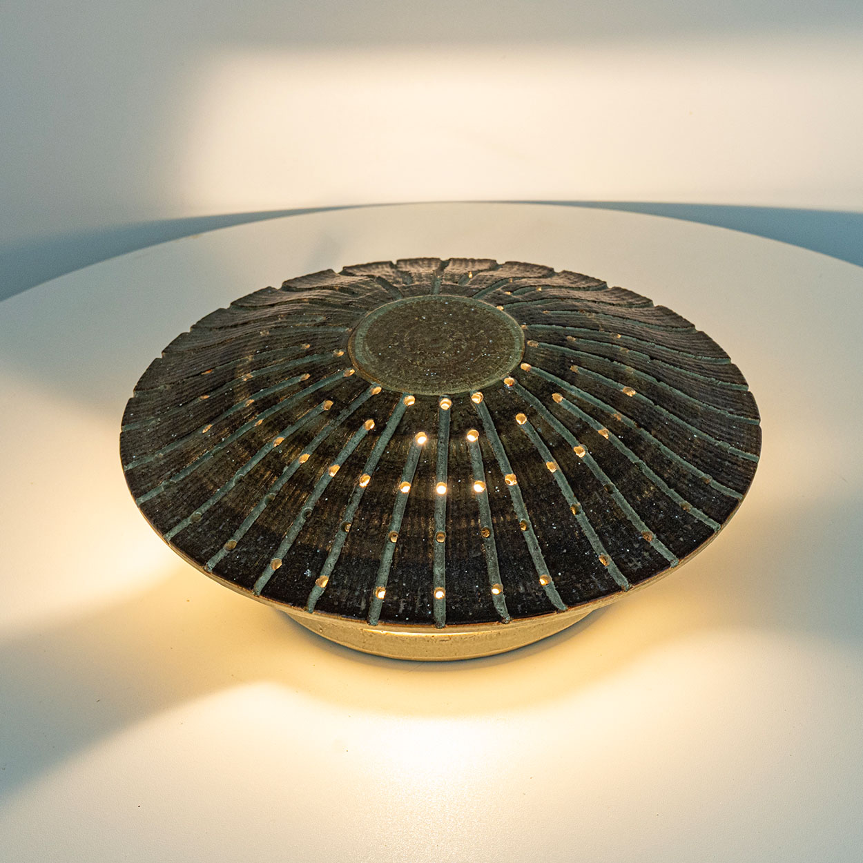 1 of the 2 Ceramic Round Wall Lights Holes in the style of Axella, Denmark 1970