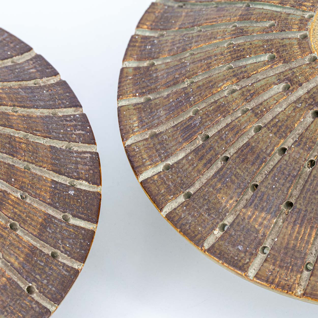 1 of the 2 Ceramic Round Wall Lights Holes in the style of Axella, Denmark 1970