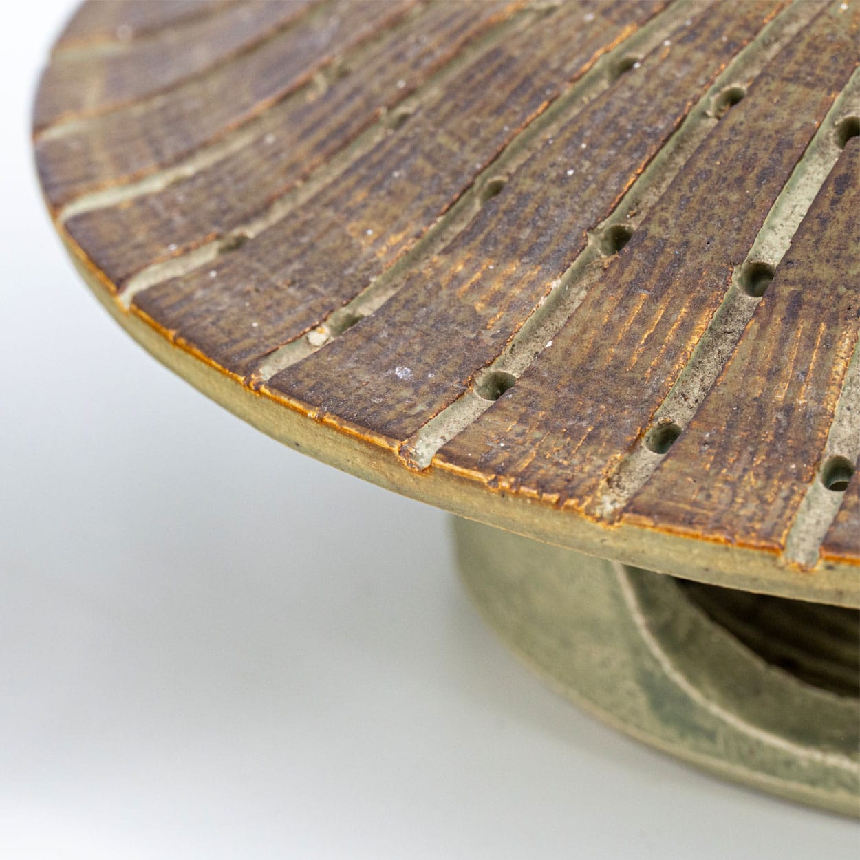 1 of the 2 Ceramic Round Wall Lights Holes in the style of Axella, Denmark 1970