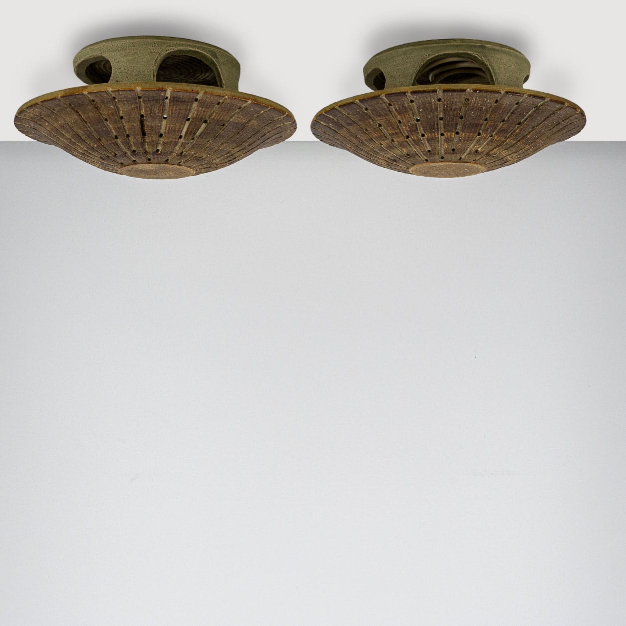 1 of the 2 Ceramic Round Wall Lights Holes in the style of Axella, Denmark 1970