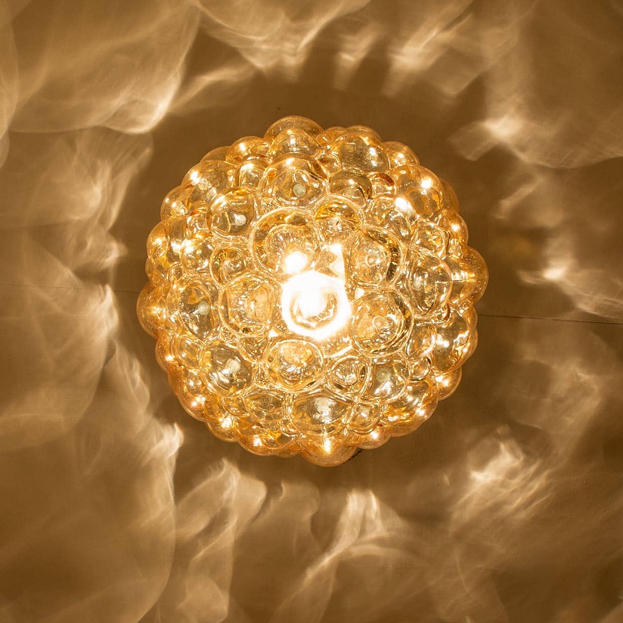 1 of the 2 Large Bubbled Glass and Brass Pendants by Helena Tynell, Germany 1970