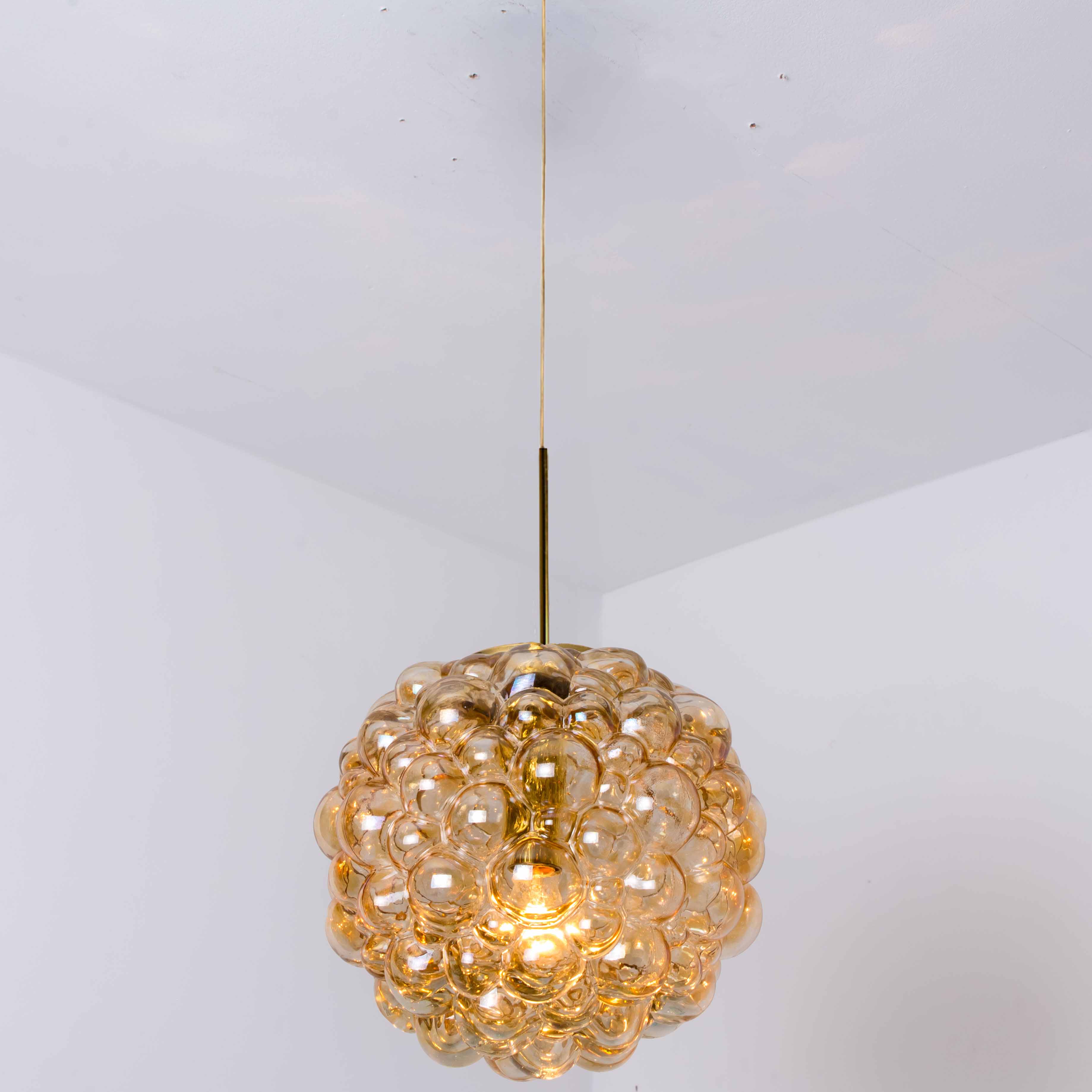 1 of the 2 Large Bubbled Glass and Brass Pendants by Helena Tynell, Germany 1970
